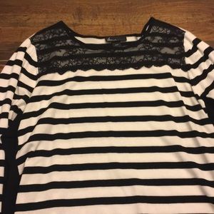 Black and white striped sweater with lace detail.